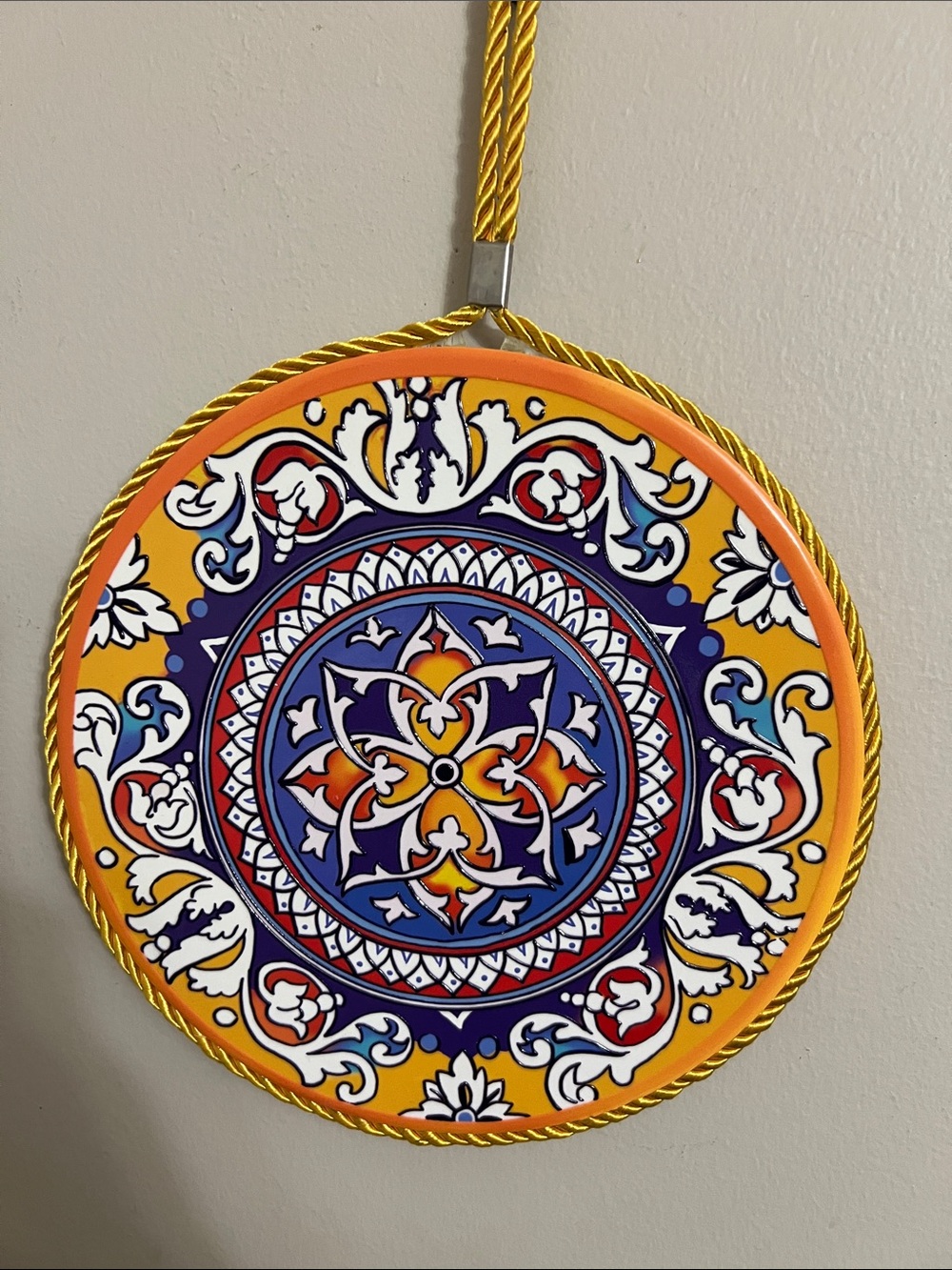 Vibrant Round Decorative Wall Plaque in Orange, Blue & White